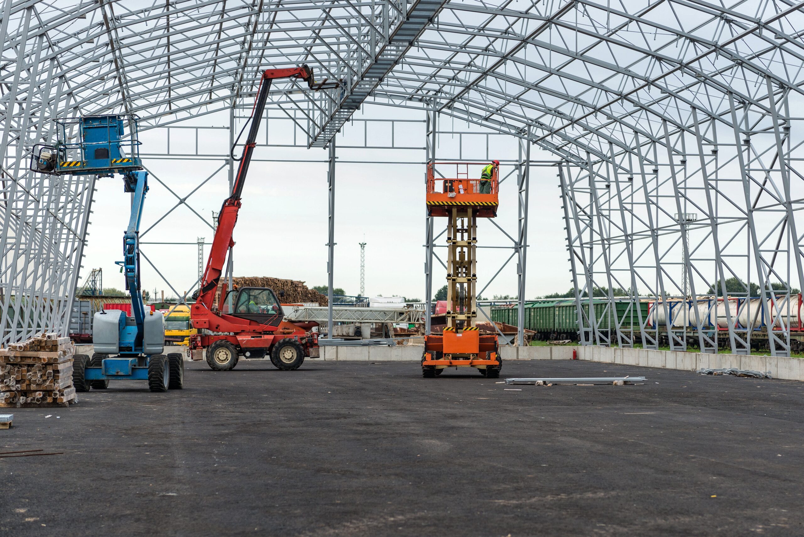 Home lift with platform work in warehouse hangar construction field.